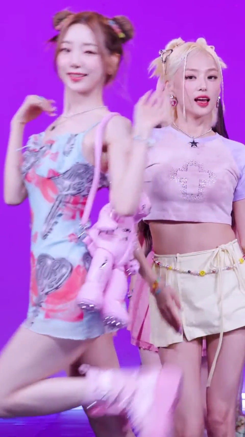 Yeonhee of EL7Z UP in a refreshing spaghetti-strap dress with space buns
