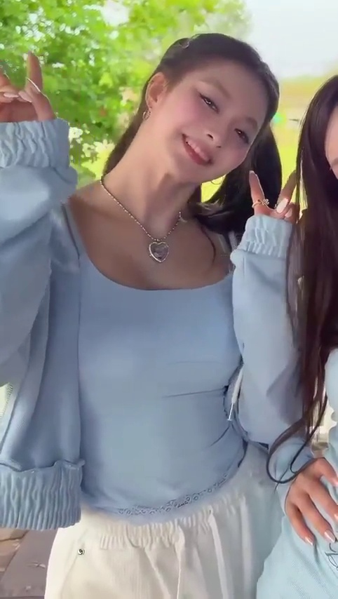FROMIS_9 Lee Nagyung in Pigtails and a Sky-Blue Tank Top Doing a Challenge